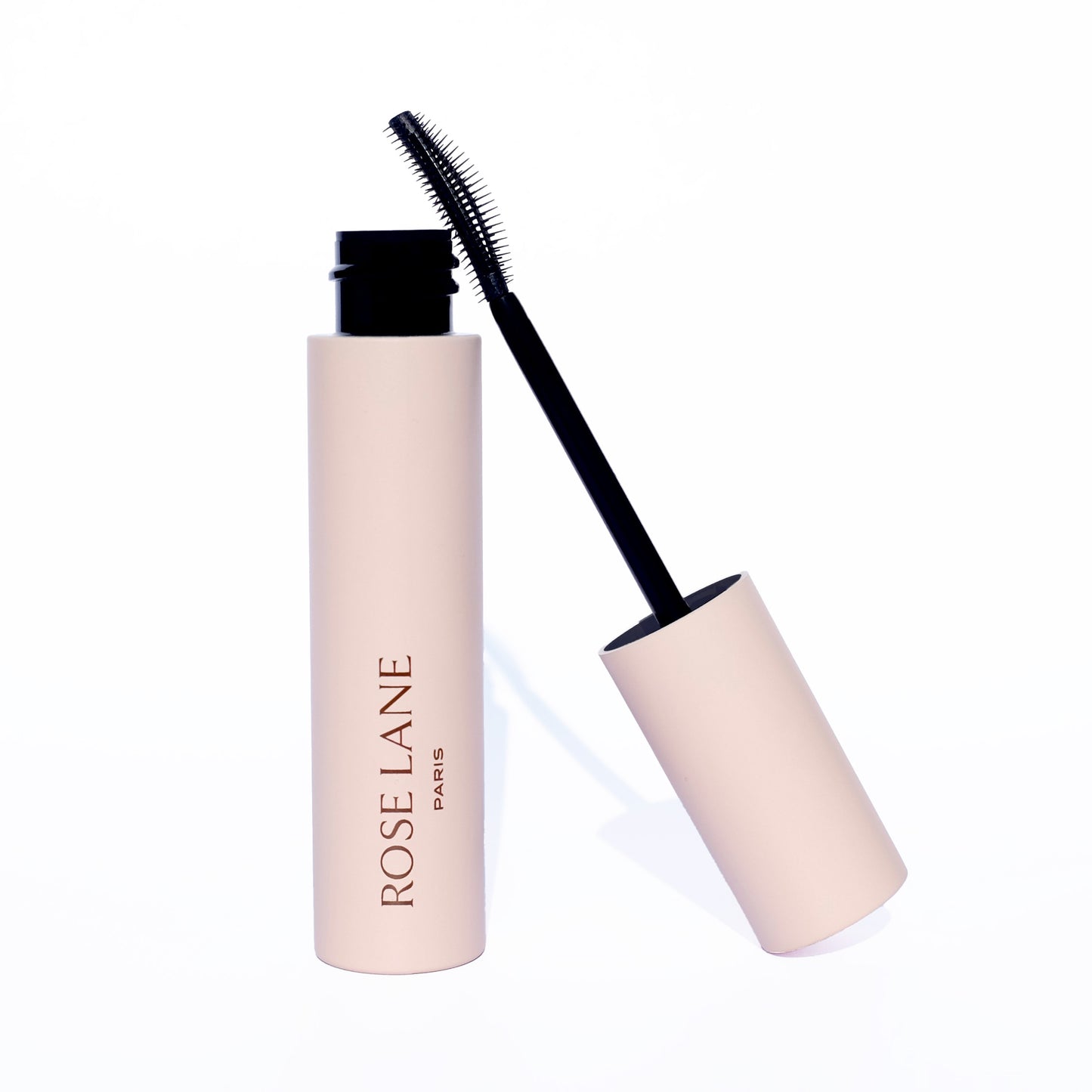 Mascara vegan et naturel noir profond sur fond de marbre Rose Lane
